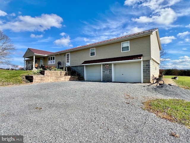 view of front of home with a garage