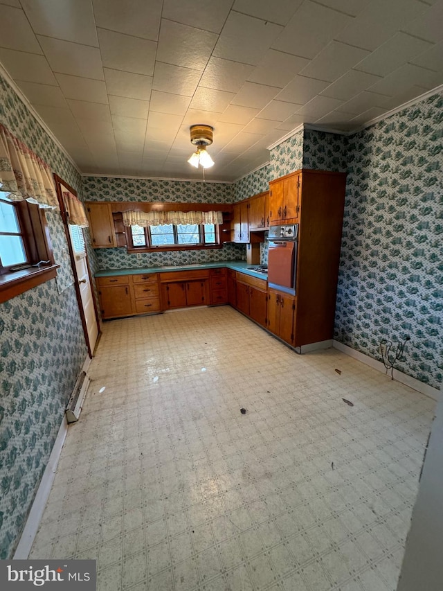 kitchen featuring white gas cooktop and oven