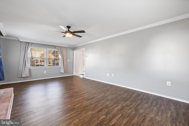 unfurnished room featuring dark wood-type flooring, ceiling fan, and ornamental molding