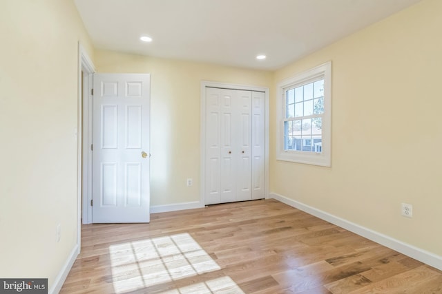 12700 Macduff Dr, Fort Washington, MD 20744 - unfurnished bedroom featuring light wood-style flooring, baseboards, recessed lighting, and a closet