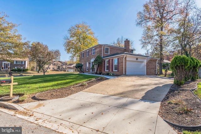 12700 Macduff Dr, Fort Washington, MD 20744 - view of home's exterior featuring brick siding, concrete driveway, a chimney, a yard, and an attached garage