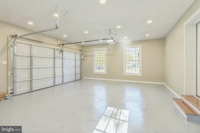 12700 Macduff Dr, Fort Washington, MD 20744 - garage with baseboards, recessed lighting, and a garage door opener