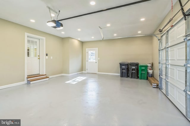12700 Macduff Dr, Fort Washington, MD 20744 - garage with a garage door opener, baseboards, and recessed lighting