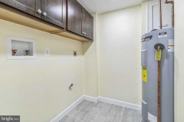 12700 Macduff Dr, Fort Washington, MD 20744 - laundry area featuring water heater, hookup for an electric dryer, washer hookup, cabinet space, and baseboards