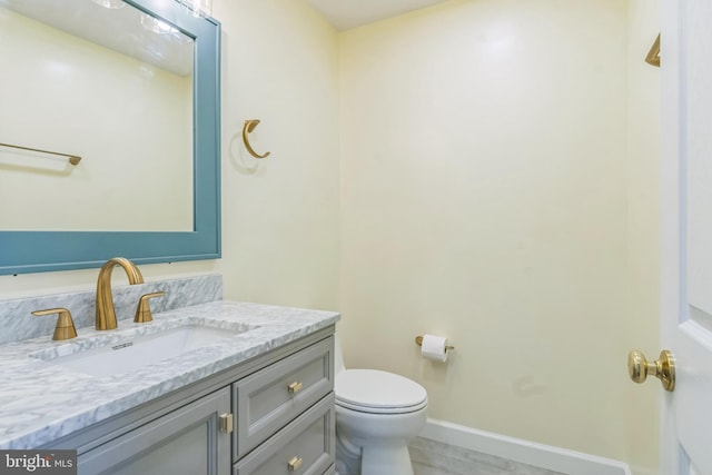 12700 Macduff Dr, Fort Washington, MD 20744 - bathroom with vanity, toilet, and baseboards