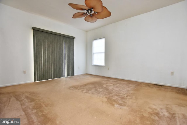 unfurnished bedroom with carpet flooring and ceiling fan