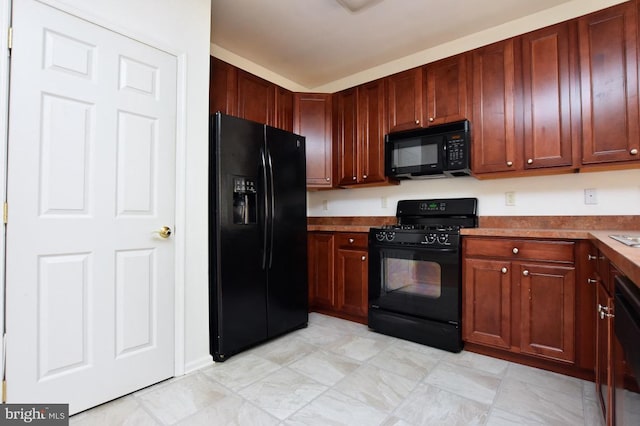 kitchen with black appliances