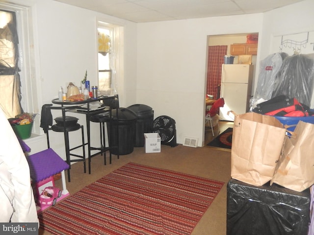 interior space featuring white fridge