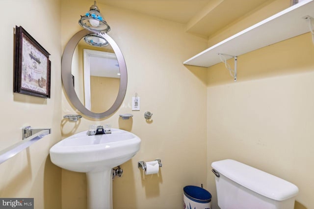 bathroom featuring toilet