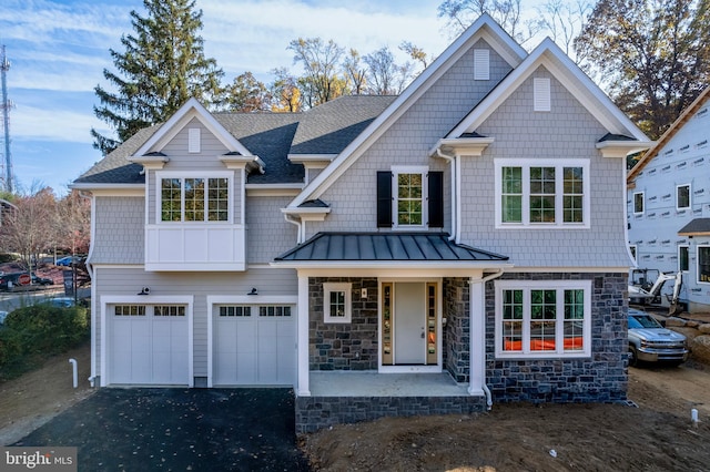 craftsman-style house featuring a garage