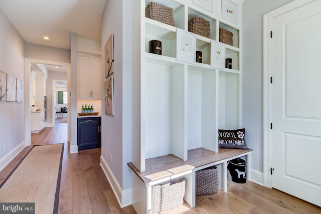 mudroom with light wood-type flooring