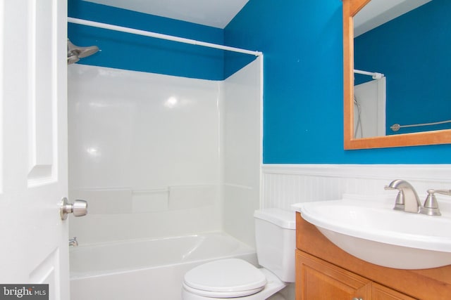 full bathroom featuring vanity, toilet, and bathing tub / shower combination