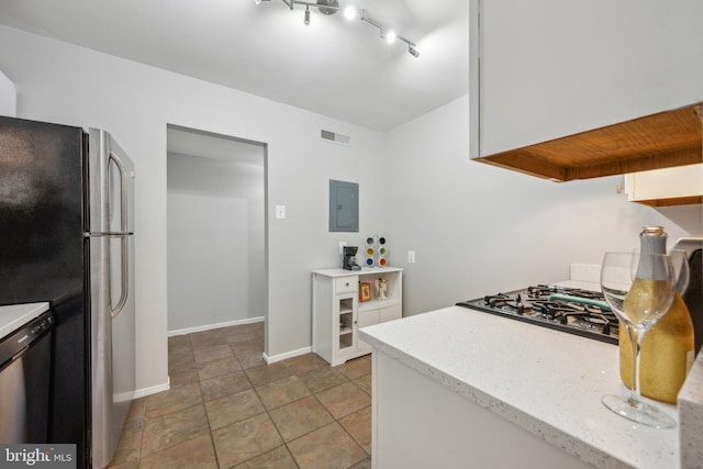 kitchen featuring electric panel and appliances with stainless steel finishes