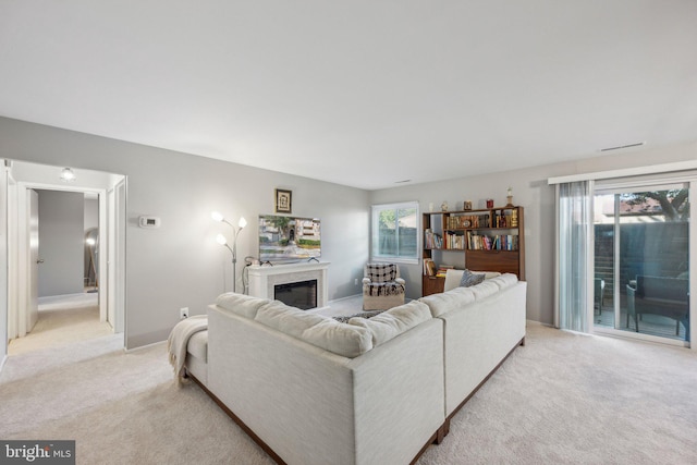 living room featuring light colored carpet