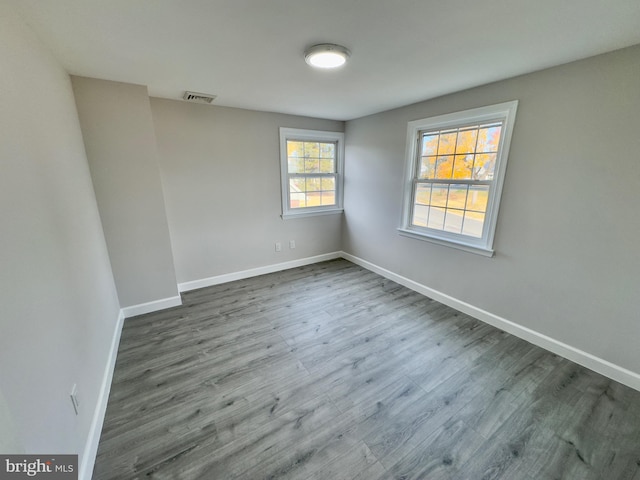 empty room featuring hardwood / wood-style flooring