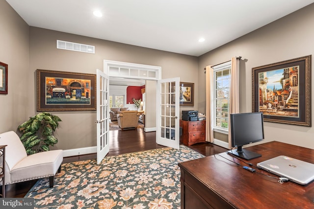 office featuring french doors and dark hardwood / wood-style flooring