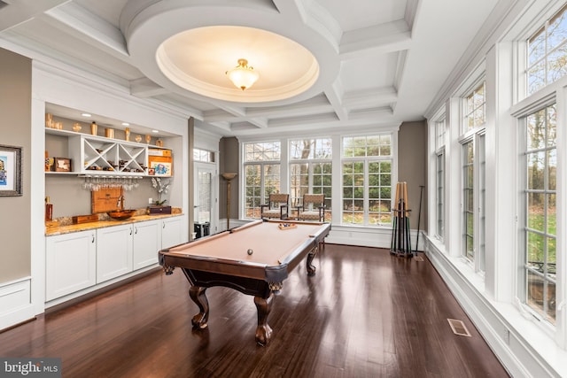 game room with coffered ceiling, crown molding, dark hardwood / wood-style flooring, billiards, and indoor bar