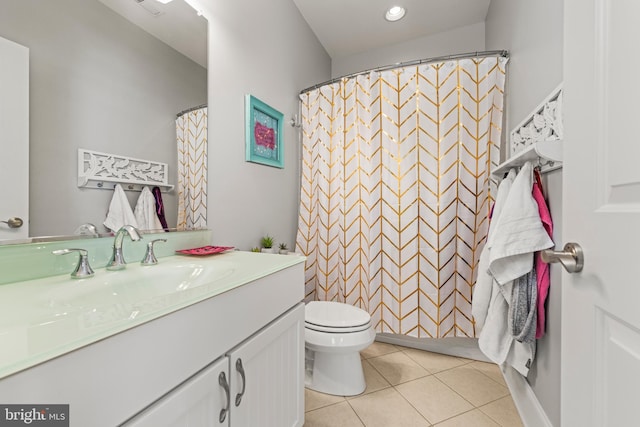 bathroom featuring tile patterned flooring, vanity, toilet, and a shower with shower curtain