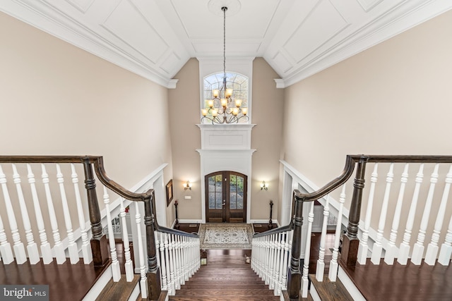 13105 Pendleton Ct, Reisterstown, MD 21136 - entryway with wood finished floors, a chandelier, stairway, ornamental molding, and french doors