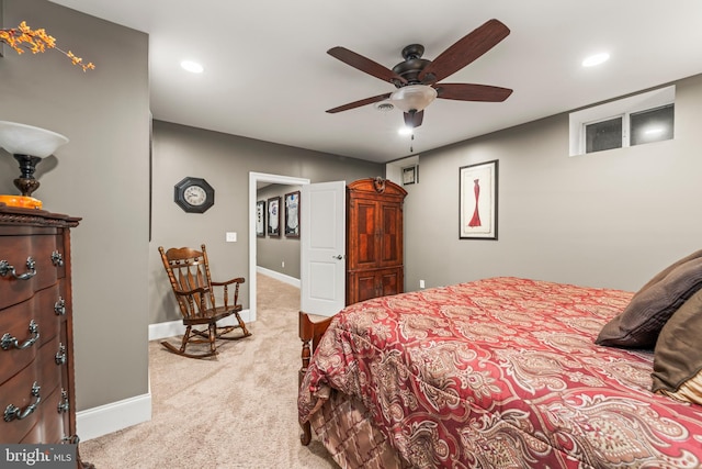 carpeted bedroom with ceiling fan