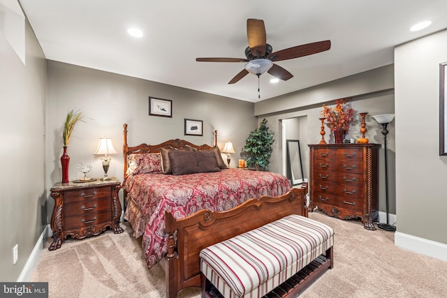 carpeted bedroom with ceiling fan