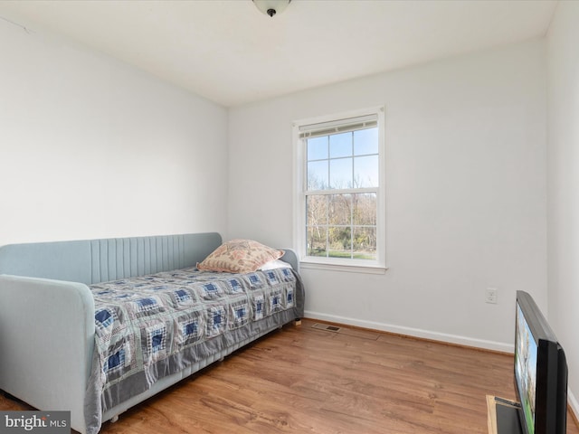 bedroom featuring light wood-type flooring