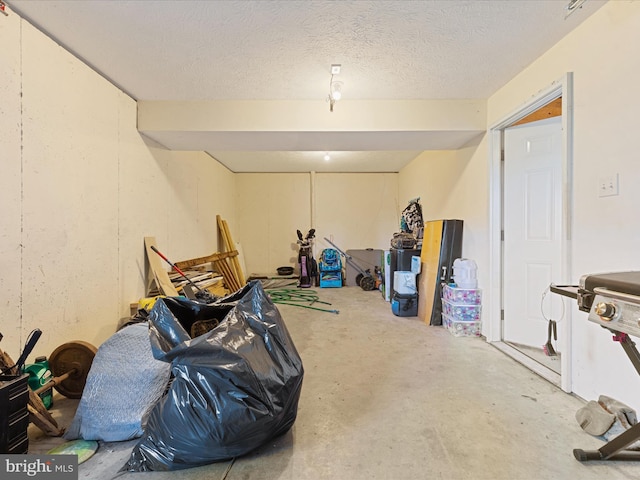 basement with a textured ceiling