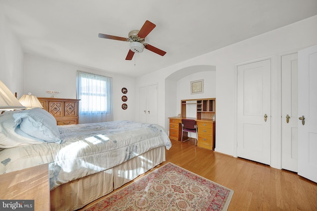 bedroom featuring light hardwood / wood-style floors and ceiling fan