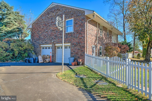 view of home's exterior with a garage