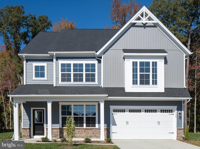 craftsman house featuring a garage and a porch