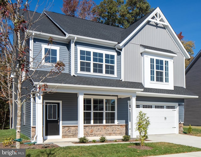 craftsman-style home with a garage and covered porch