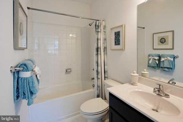 full bathroom featuring tile patterned flooring, vanity, toilet, and shower / tub combo with curtain