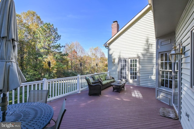 deck with an outdoor living space