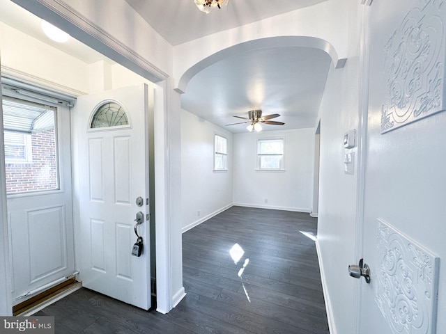 entrance foyer with dark hardwood / wood-style flooring and ceiling fan