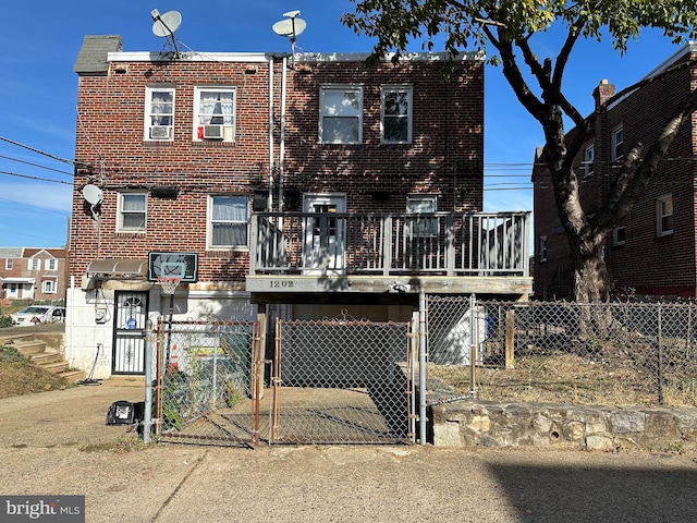 view of front facade featuring a wooden deck