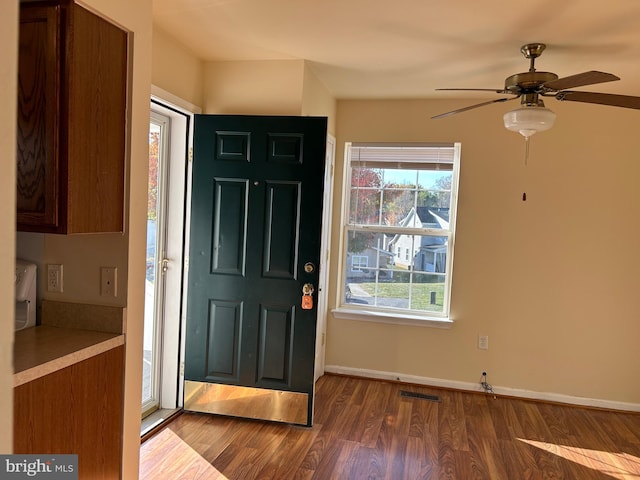 entryway with hardwood / wood-style flooring and ceiling fan