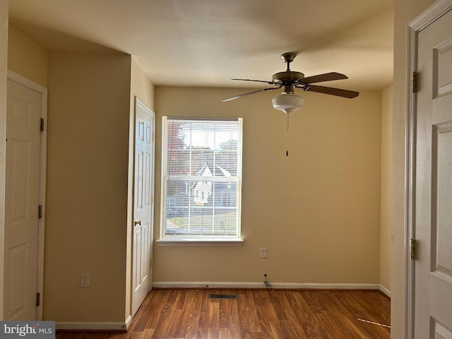 unfurnished bedroom with hardwood / wood-style flooring and ceiling fan