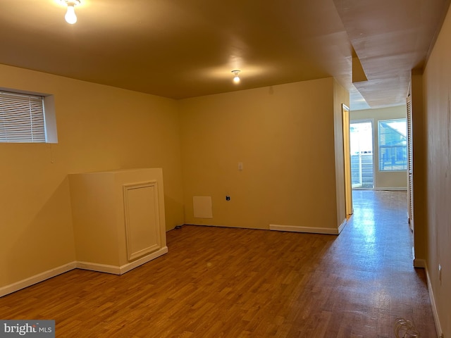 unfurnished room featuring wood-type flooring