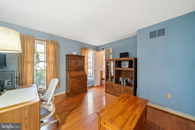 office featuring light hardwood / wood-style floors