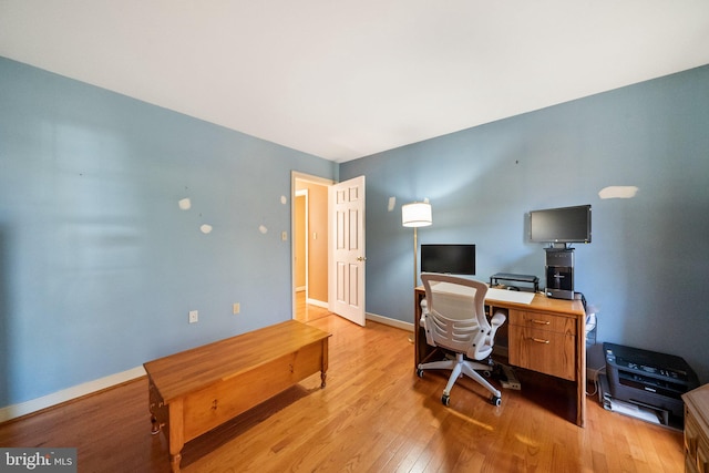 home office featuring light wood-type flooring