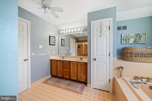 bathroom with independent shower and bath, vanity, and ceiling fan