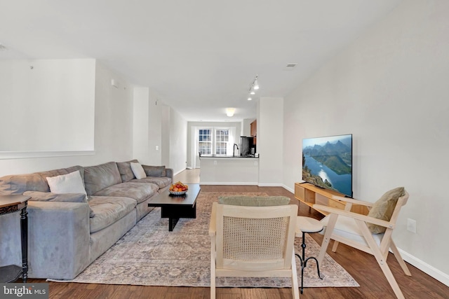 living room with hardwood / wood-style flooring