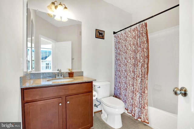 full bathroom with vanity, toilet, shower / bath combo with shower curtain, and a chandelier