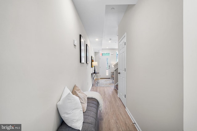 corridor featuring light wood-type flooring