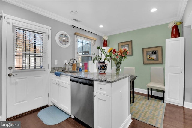 kitchen featuring white cabinets, a wealth of natural light, light stone countertops, and dishwasher