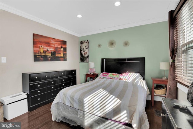 bedroom with dark wood-type flooring and crown molding