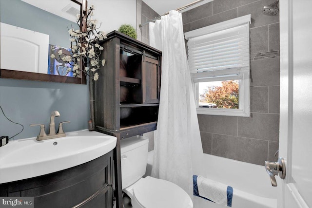 full bathroom with vanity, toilet, and shower / bath combination with curtain