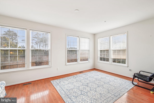 living area featuring light hardwood / wood-style floors