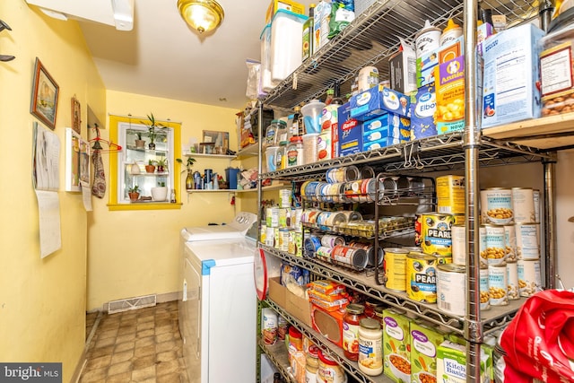 laundry area featuring independent washer and dryer