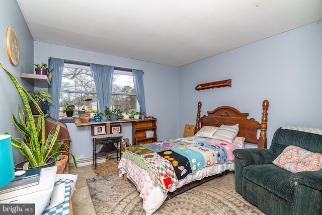 bedroom with baseboard heating